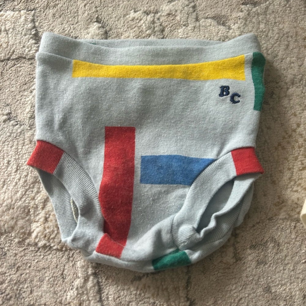Bobo Choses Light Blue Shorts with Red, Yellow, Blue & Green Accents